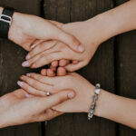 A couple holding hands